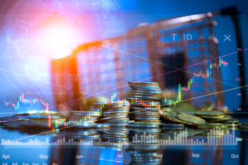 Stacked Coins with Stock Market Chart and Rising Trend Line for Investment and Financial Growth Concept