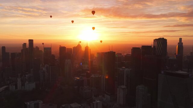 Sunrise Drone Footage of Melbourne Skyline with Hot Air Balloons