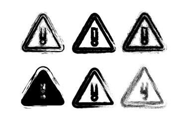 A collection of abstract grunge warning icons featuring rough, hand drawn triangle shapes with exclamation marks. These distressed caution symbols are perfect for creative design projects.