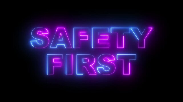 glowing neon safety first text icon animation on black background. neon safety first sign. neon safety first video animation. 4k motion video. 