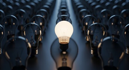 Bright idea stands out in a row of dim bulbs, a symbol of innovation and leadership, spotlighting unique business vision and solutions