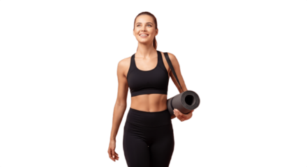 Fit smiling woman in black sports bra and leggings holding a rolled-up yoga mat over her shoulder, looking upward with a cheerful expression, active lifestyle fitness portrait on white background