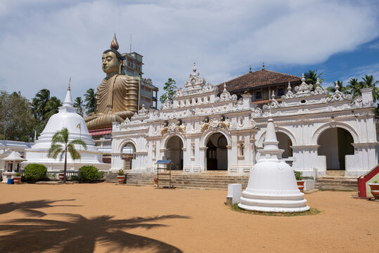 DIKWELLA, SRI LANKA - FEBRUARY 17, 2020: The facade of the ancient Buddhist temple Wewrukannala Buduraja Maha Viharaya