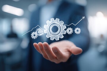 Businessman holds holographic gears and graph