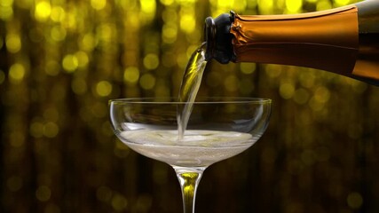 Close up pour champagne in a coupe glass. Sparkling wine pouring into glass.
pouring champagne wine from bottle in a coupe glass. champagne poured in a champagne glass.