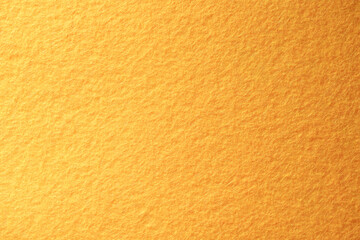Close-Up of Orange Felt Fabric with Soft Fibrous Texture