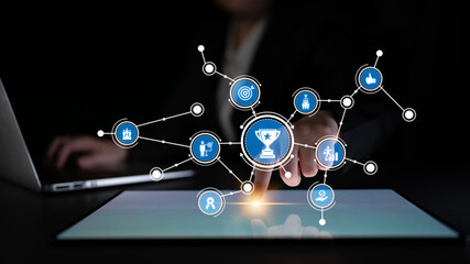 Visual representation of digital interaction showcasing success and networking through engaging icons, set in a modern workspace environment with emphasis on technology. Tessel