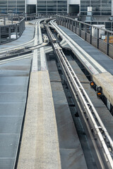 Automated guideway transit system tracks converging at a junction