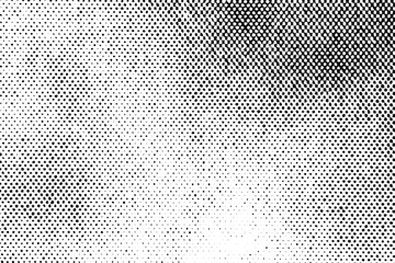 Halftone texture with dense black dots transitioning to lighter areas, forming a gradient on a transparent background.