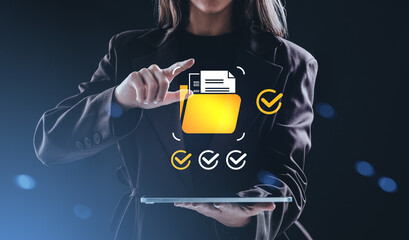 Businesswoman accessing digital document folder interface using