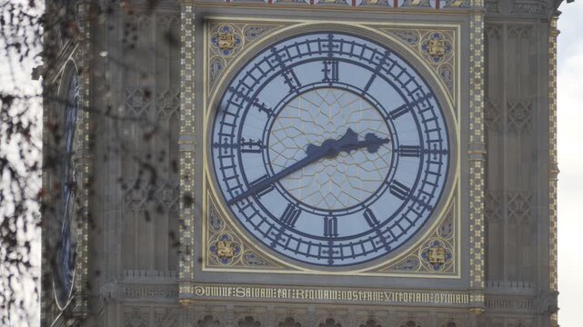 Detailed close-up of the clock face on the Big Ben tower.