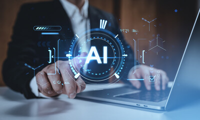 Businessman interacting with futuristic AI hologram interface on laptop, technology concept background with creative digital elements and tech visuals.