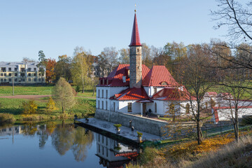 The ancient Priory Palace in the autumn cityscape on a sunny October day. Gatchina, Russia