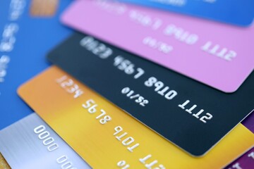 Many credit or debit cards with fictional specimen numbers. Big amount of banking plastic cards of...