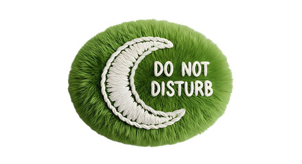 A green furry disc with a crescent and do not disturb message