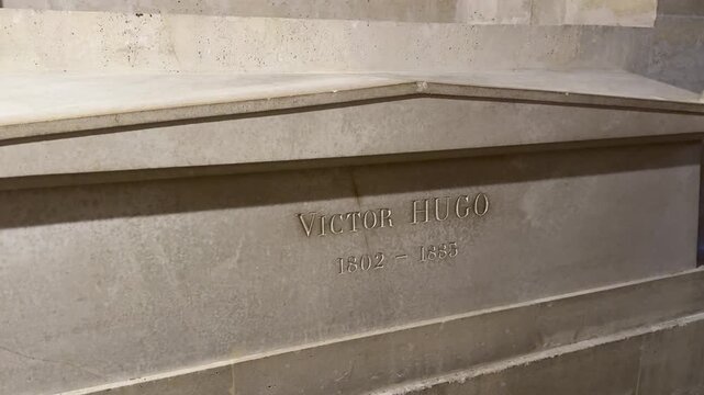 Grave of Victor Hugo in Paris, France, showing the historic tomb and surrounding memorial, ideal for history, literature, and cultural heritage footage.