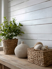 Indoor rustic decor with wicker baskets and potted plant.