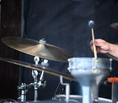 The drummer starts the concert