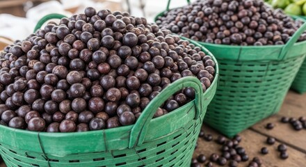Acai Berries Harvested in Green Baskets
