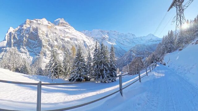 First snowfall blankets the traditional car-free alpine village of M&uuml;rren with stunning views of the Eiger, M&ouml;nch, and Jungfrau mountains. Winter travel scene