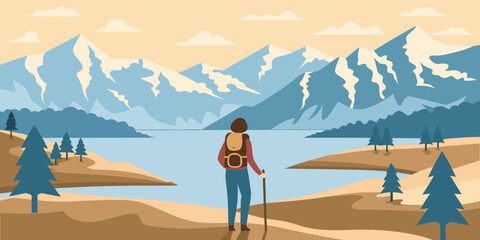 Hiker enjoying the mountain view by the lake on a sunny day