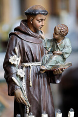 Basilica Santa Maria in Montesanto. Saint Anthony tenderly holding Christ Child. Statue.