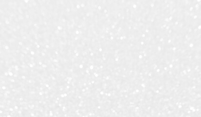 White and gray bokeh background. Photo can be used for the concepts of New Year, Christmas, Wedding Anniversary and all celebrations.