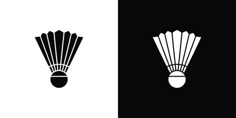 Obraz premium Shuttlecock with White Feathers and Black Bottom on Split Black and White Background