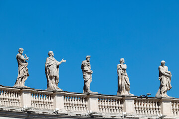St. Peter&rsquo;s Basilica. Colossal saints watch the piazza, sculpted robes and beards echo classical forms on Vatican architecture.