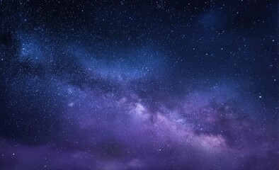 Fototapeta premium Celestial expanse of stars and nebulous cosmic dust in blues, purples, and deep blacks