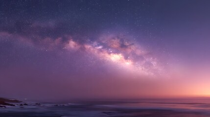 Fototapeta premium Vibrant Milky Way Galaxy Over a Calm Ocean at Twilight.