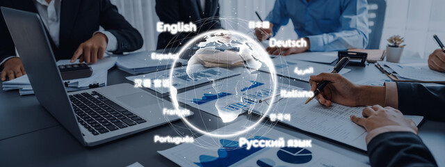 Modern business meeting showcasing diverse languages and technology to enhance communication and collaboration in an international corporate environment. Trope © InfiniteFlow