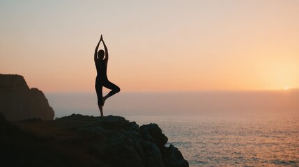 Yoga Practitioner In Tree Pose On Cliff At Sunset. Serenity And Balance In Nature