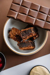 Ingredients for making chocolate, cream and cherry brownies