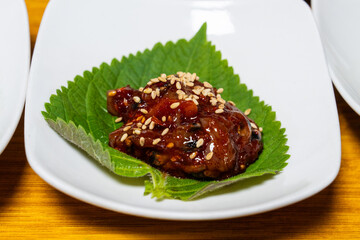 spicy salted fermented octopus called nakjijeot in Korea