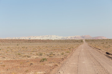 The road to the Aktau mountains in the Altyn-Emel (or Altyn Emel) national park. Zhetysu region, Kazakhstan.