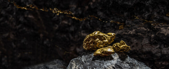 A gold vein, small pieces of gold nuggets within a rock, accumulation of gold in rocks, formed in cracks, faults, or fissures. Close up view