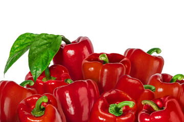 Large pile of fresh red bell peppers with stems and one with a green leaf, isolated on transparent background. Fresh vegetable with green stem, perfect for healthy food, cooking, and vegetarian design