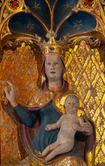 Statue (19th century) of Blessed Virgin Mary holding baby Jesus Christ in her arms.