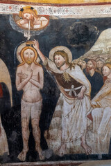 Naklejka premium Fresco (14th century) of Baptism of Jesus by John the Baptist in the Jordan river.