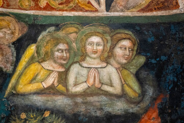 Fresco (18th century) of a group of angels in adoration and prayer.