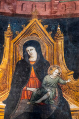 Obraz premium Fresco (15th century) of Blessed Virgin Mary holding baby Jesus Christ in her arms.