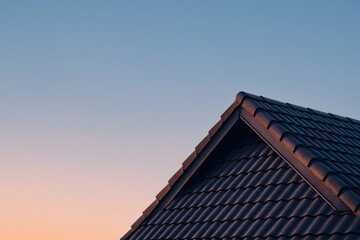 Detailed close up of the rooftop with sunset colors over blue light sunny background