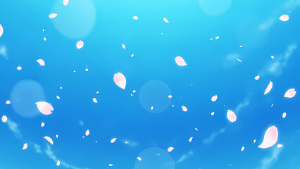 晴天を舞う桜の花びらの背景素材