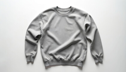 Flat lay of grey sweatshirt isolated on white. Basic style unisex clothing item, casual style. Fashion apparel for everyday wear. Textile texture of jersey material simple elegant design.