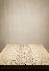 Rustic wooden planks against a muted concrete backdrop ready for product