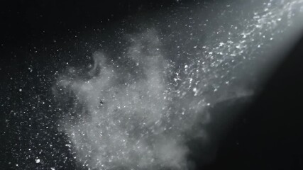 Dynamic dust particles dance in a beam of light, creating a magical and ethereal atmosphere for captivating visual effects in your projects
