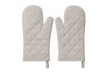Pair of cream oven mitts for cooking and baking, providing heat protection in a domestic kitchen environment