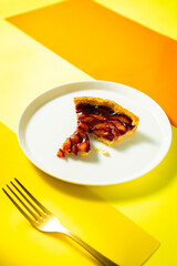 fresh baked cuttedplum pie with crust pastry