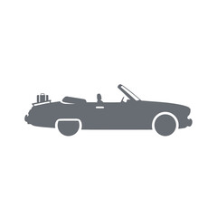 Silhouette of a Classic Gray Convertible Car with Luggage on the Trunk.